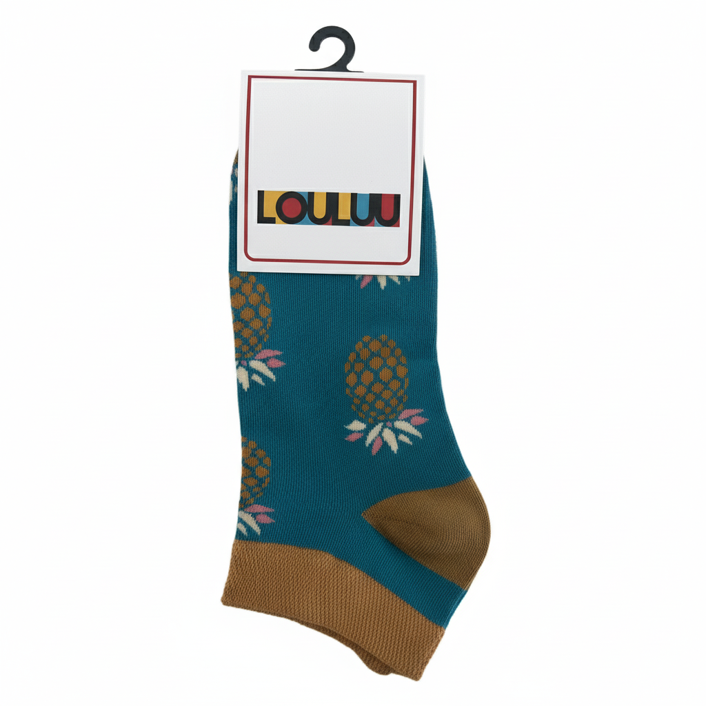 Sock with pineapple pattern on a white background, featuring the brand 'LOULOU'.