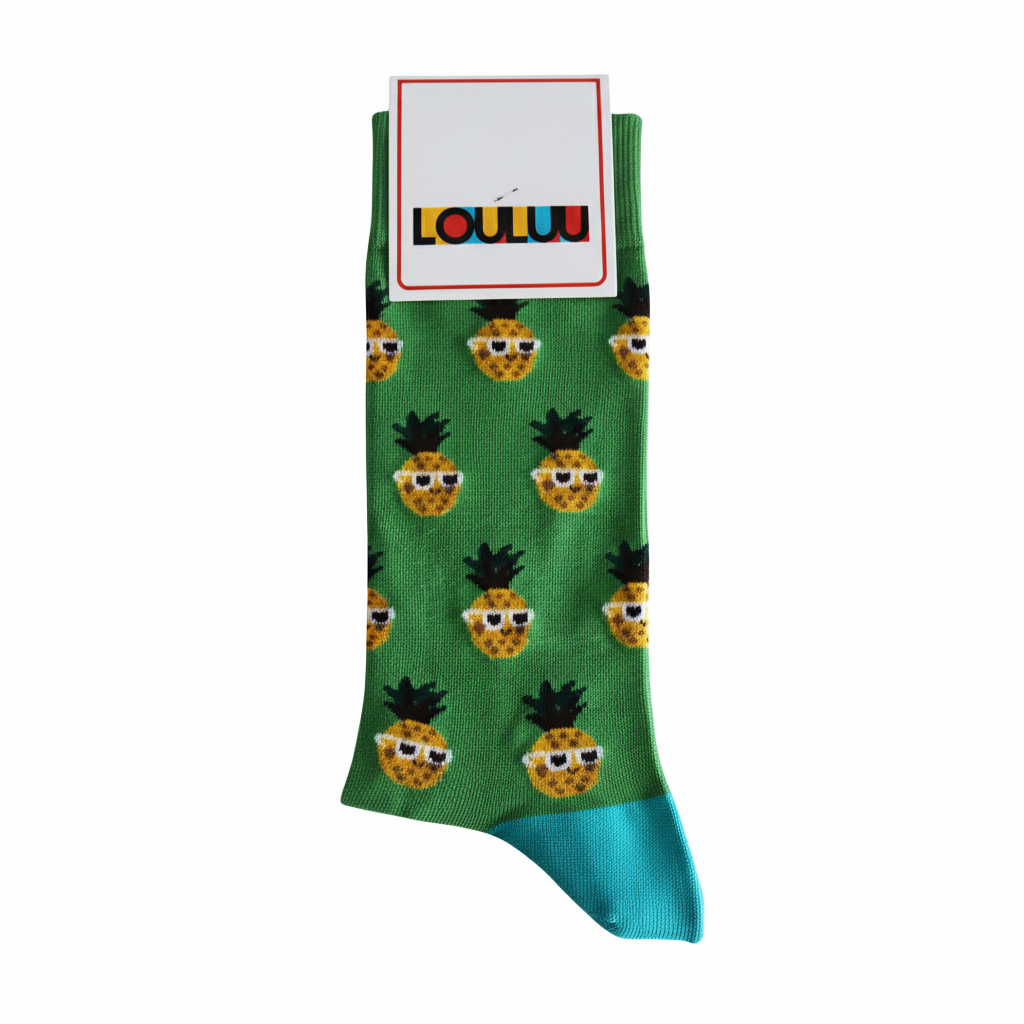 Green sock with pineapple pattern and sunglasses on a white background, featuring the brand 'LOULOU'.