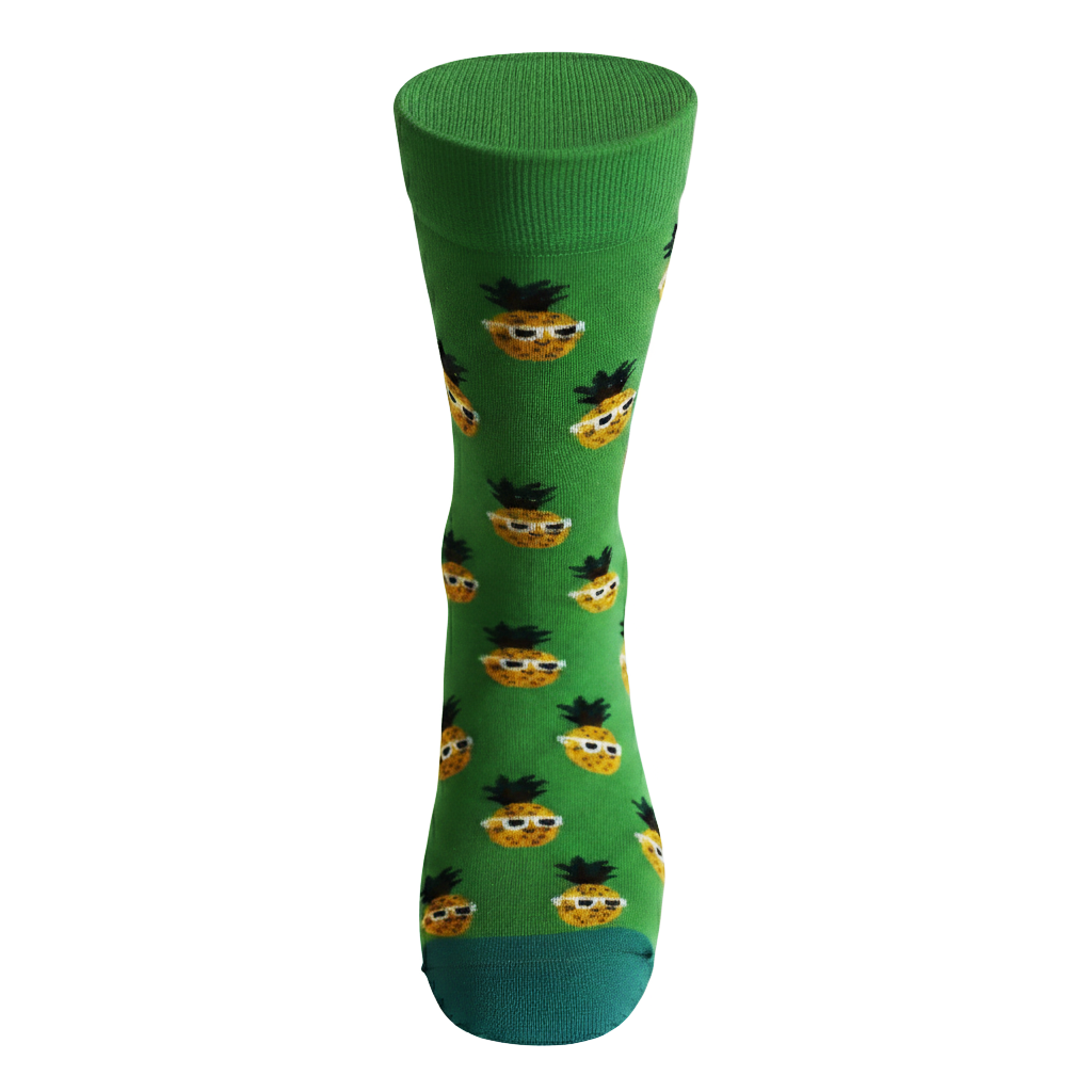 Green sock with pineapple pattern on a white background