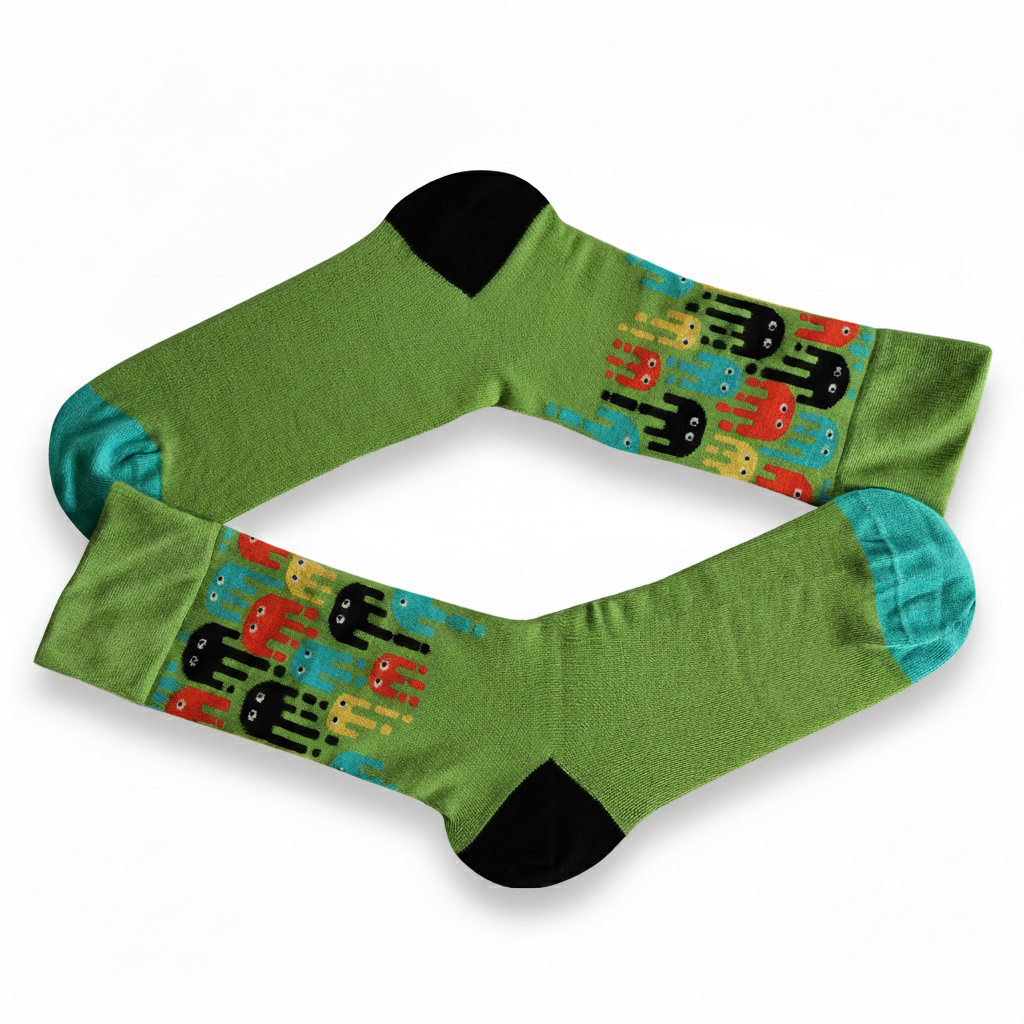Green socks with colorful pattern on a white background