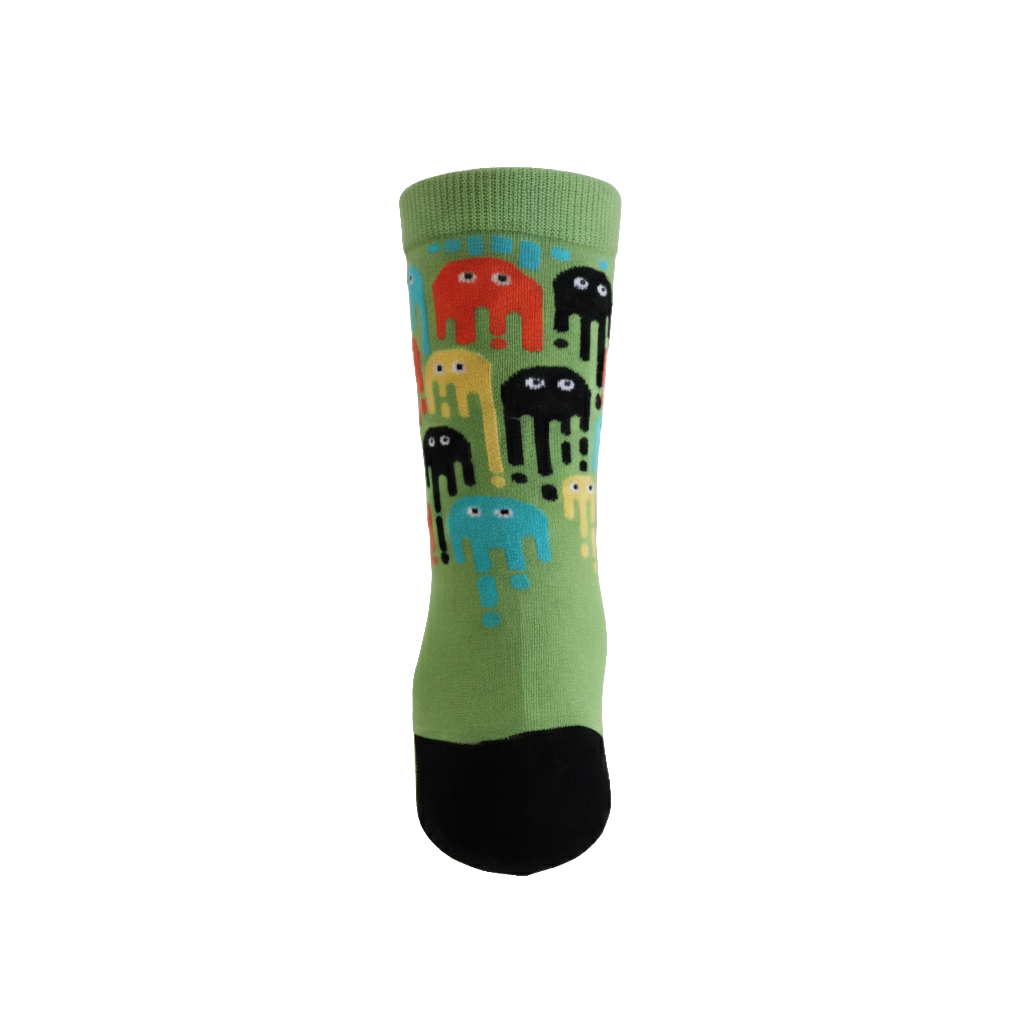 Green sock with colorful elephant pattern on a white background