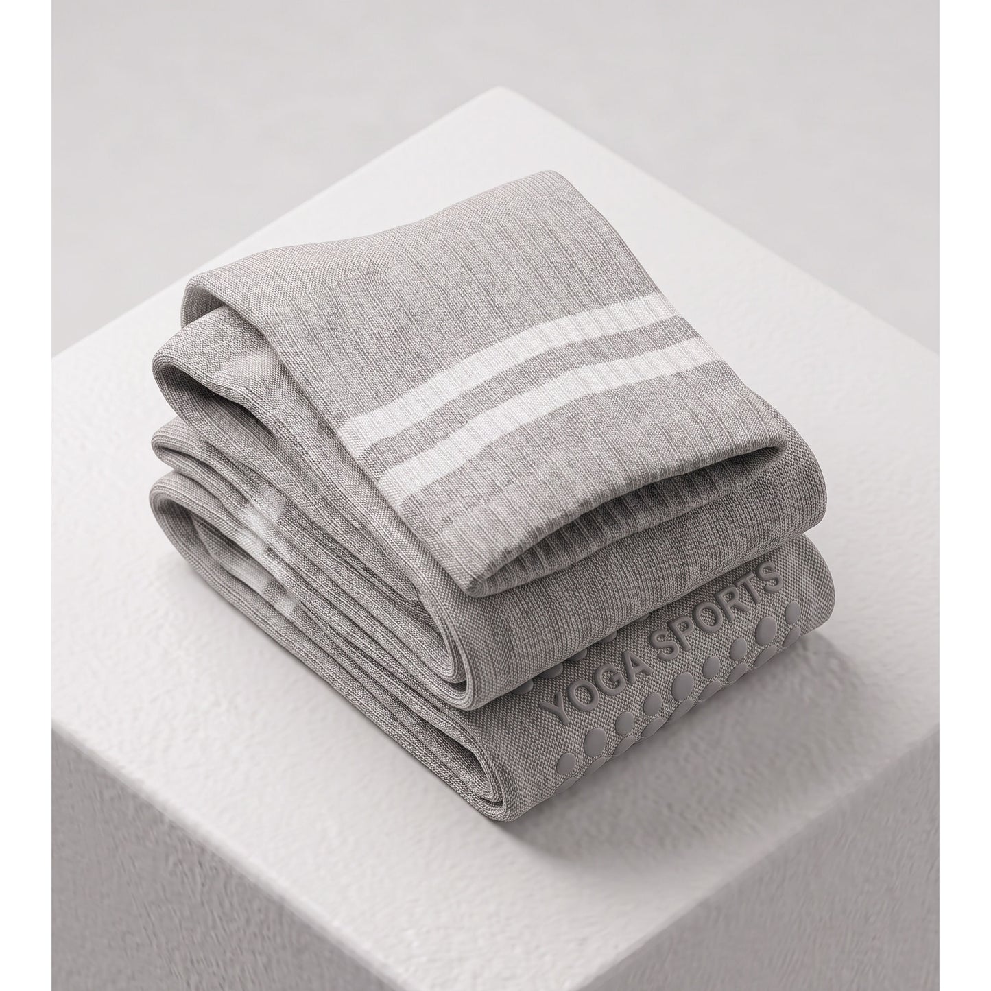 Folded pair of grey ribbed crew grip socks with double stripe cuff