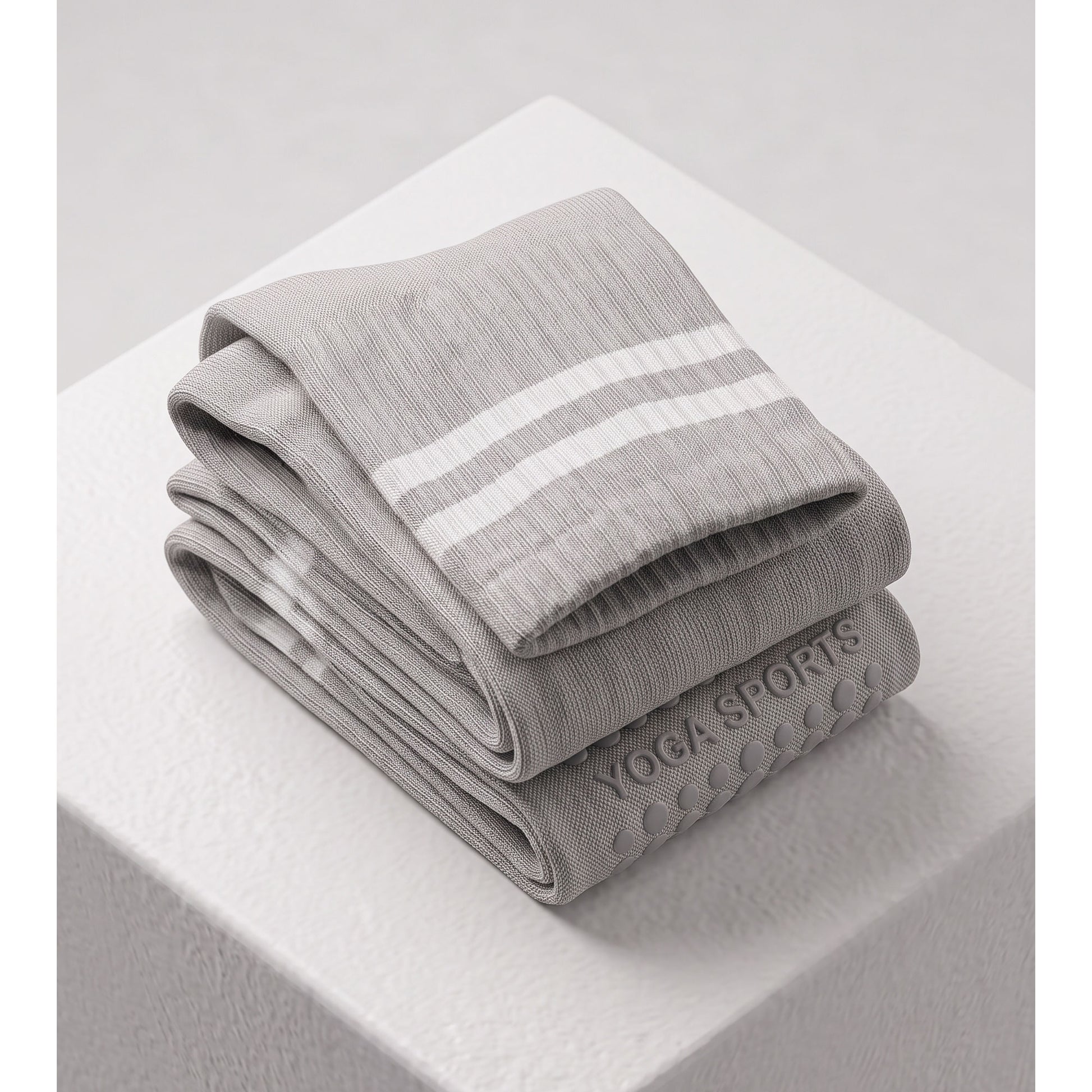 Folded pair of grey ribbed crew grip socks with double stripe cuff