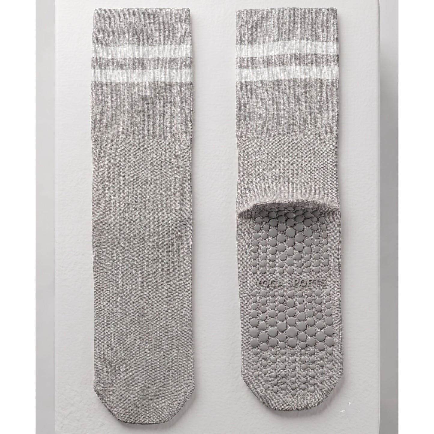 Grey crew grip socks — outer and non-slip silicone sole, flat lay