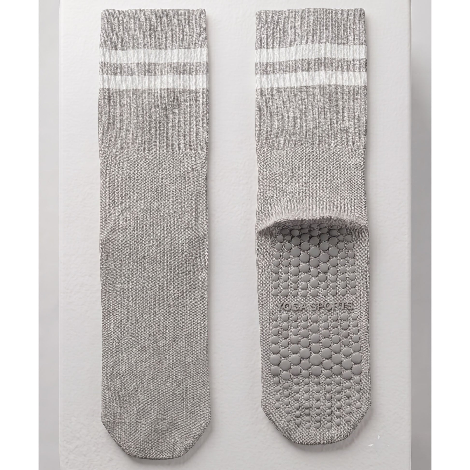 Grey crew grip socks — outer and non-slip silicone sole, flat lay