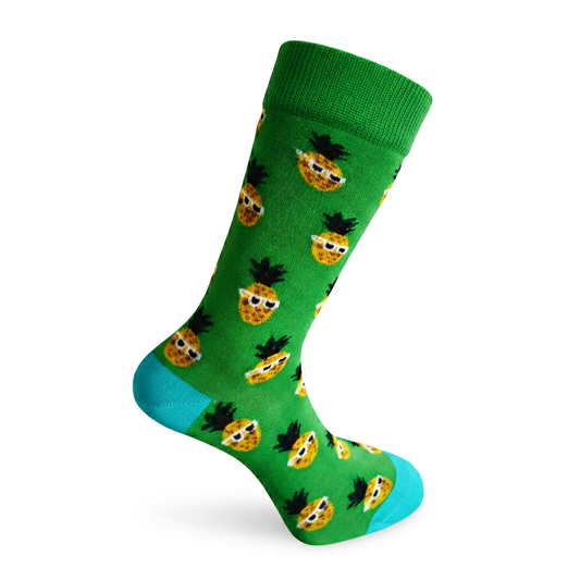Green sock with pineapple pattern on a white background