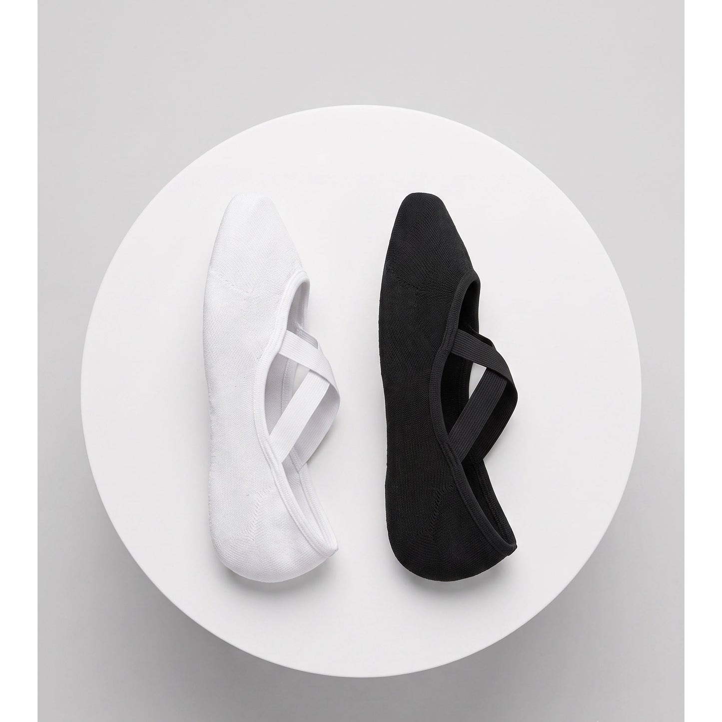 White and black ballet grip socks — top view