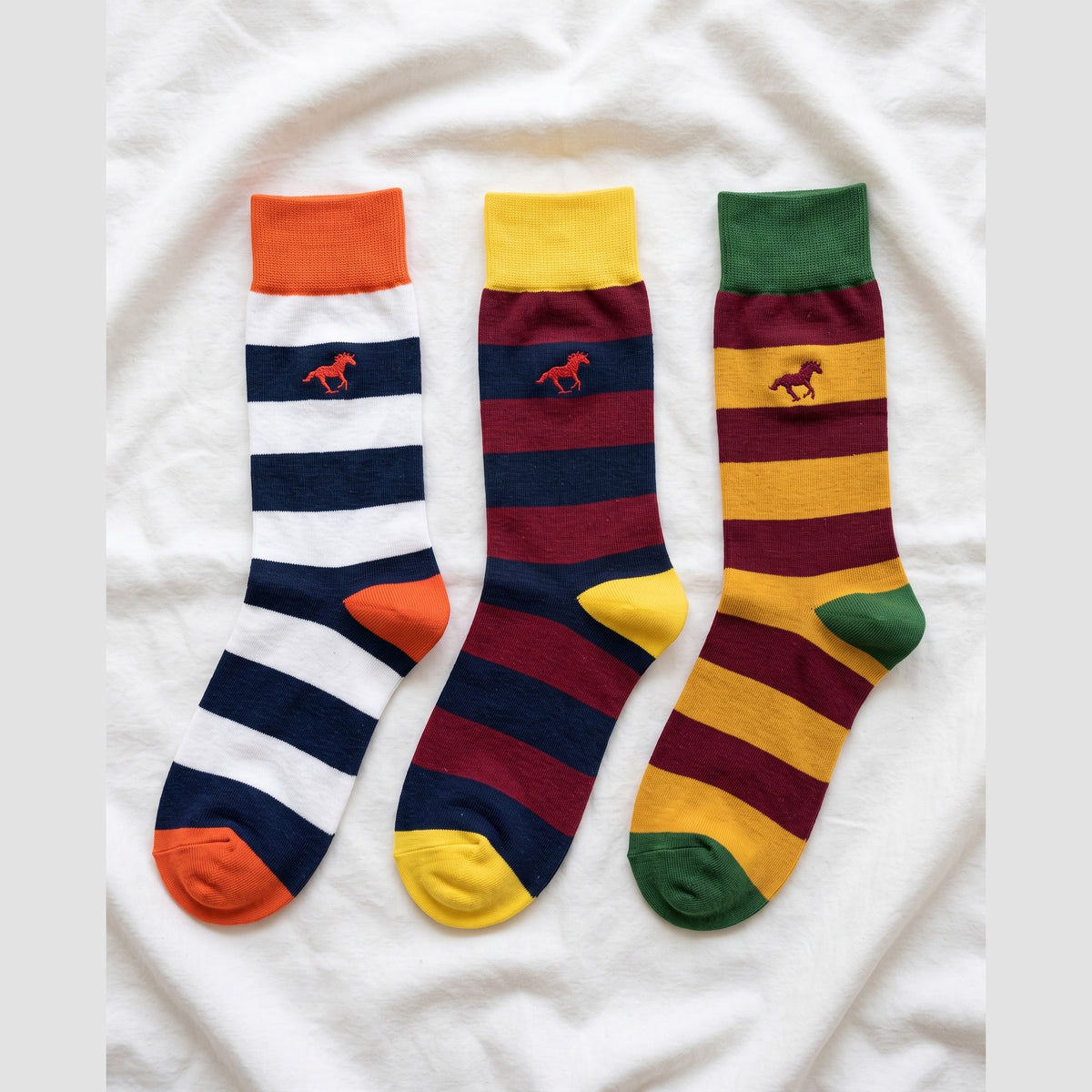 Louluu Galloper Rugby stripe crew socks in navy and white, burgundy and navy, burgundy and mustard — flat lay
