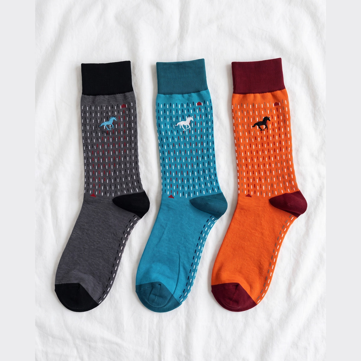 Louluu Galloper Stitch dash-knit crew socks in grey, blue and orange with contrast cuffs — flat lay