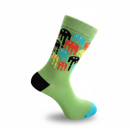 Green sock with colorful alien design on a white background
