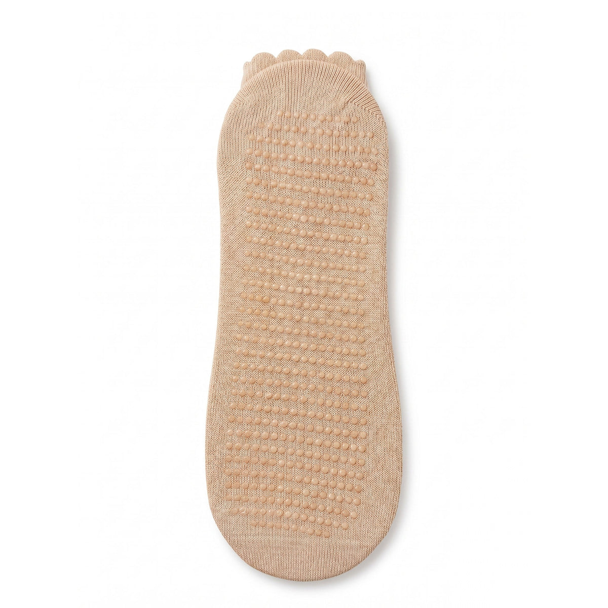 Nude pilates grip sock sole with non-slip silicone grip dots