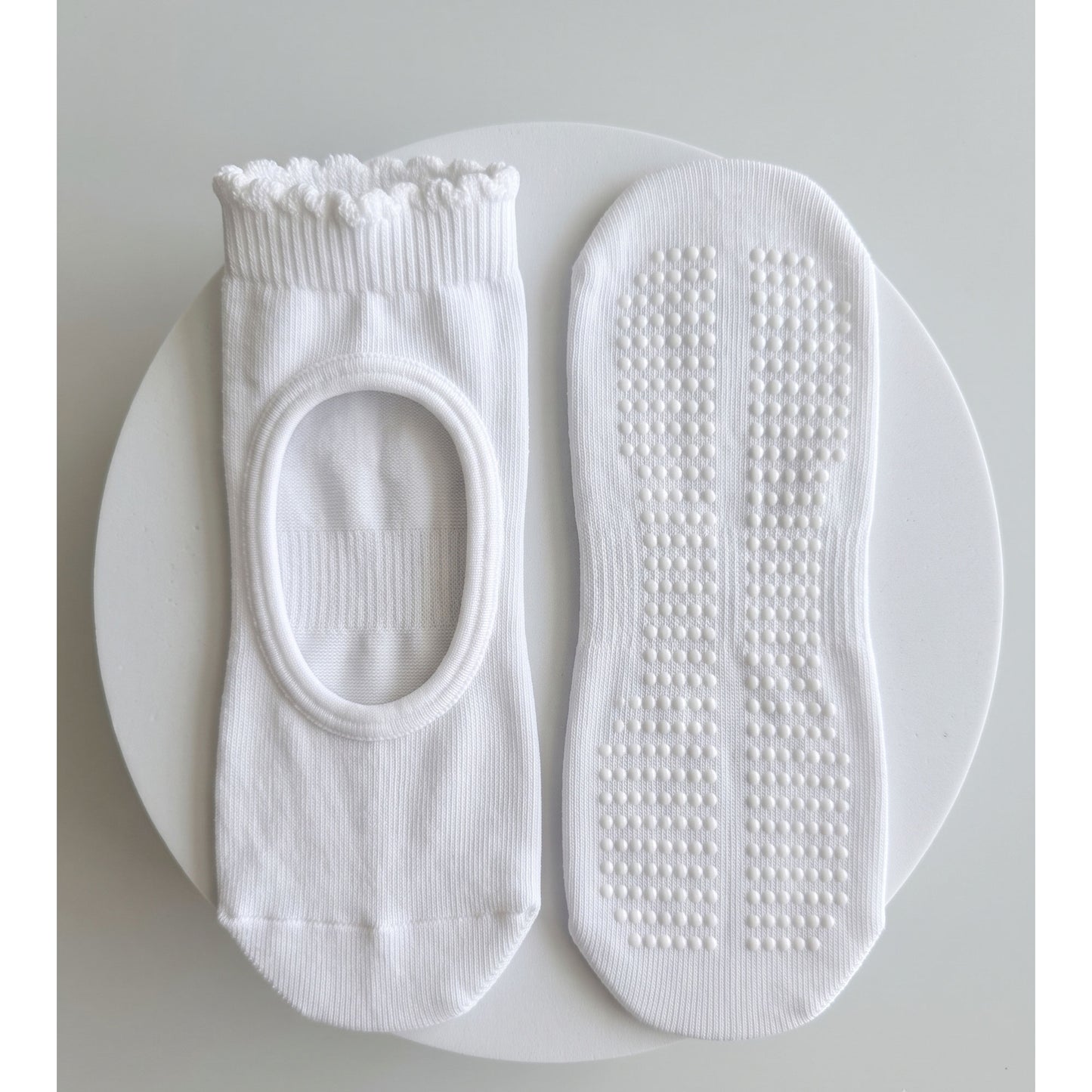 White pilates grip sock — open instep and non-slip grip sole