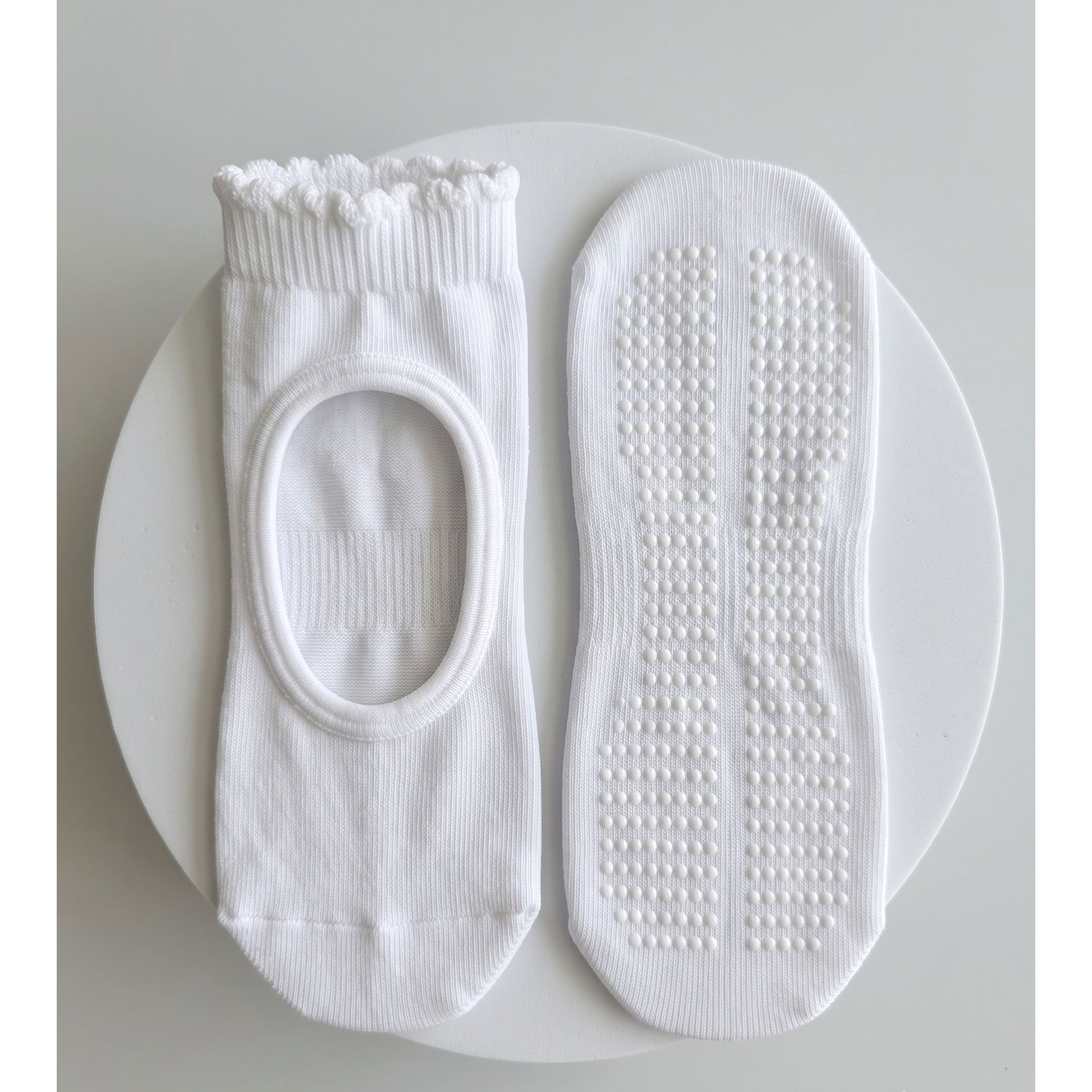 White pilates grip sock — open instep and non-slip grip sole